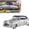 1950 Chevrolet Bel Air Lowrider Silver Metallic with Blue Metallic Top “Get Low” Series 1/24 Diecast Model Car by Motormax